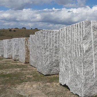 Blanco Perla granite blocks